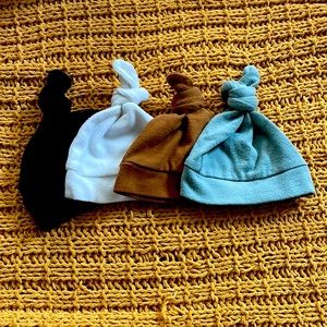 0-3 Months beanies in 4 different colors